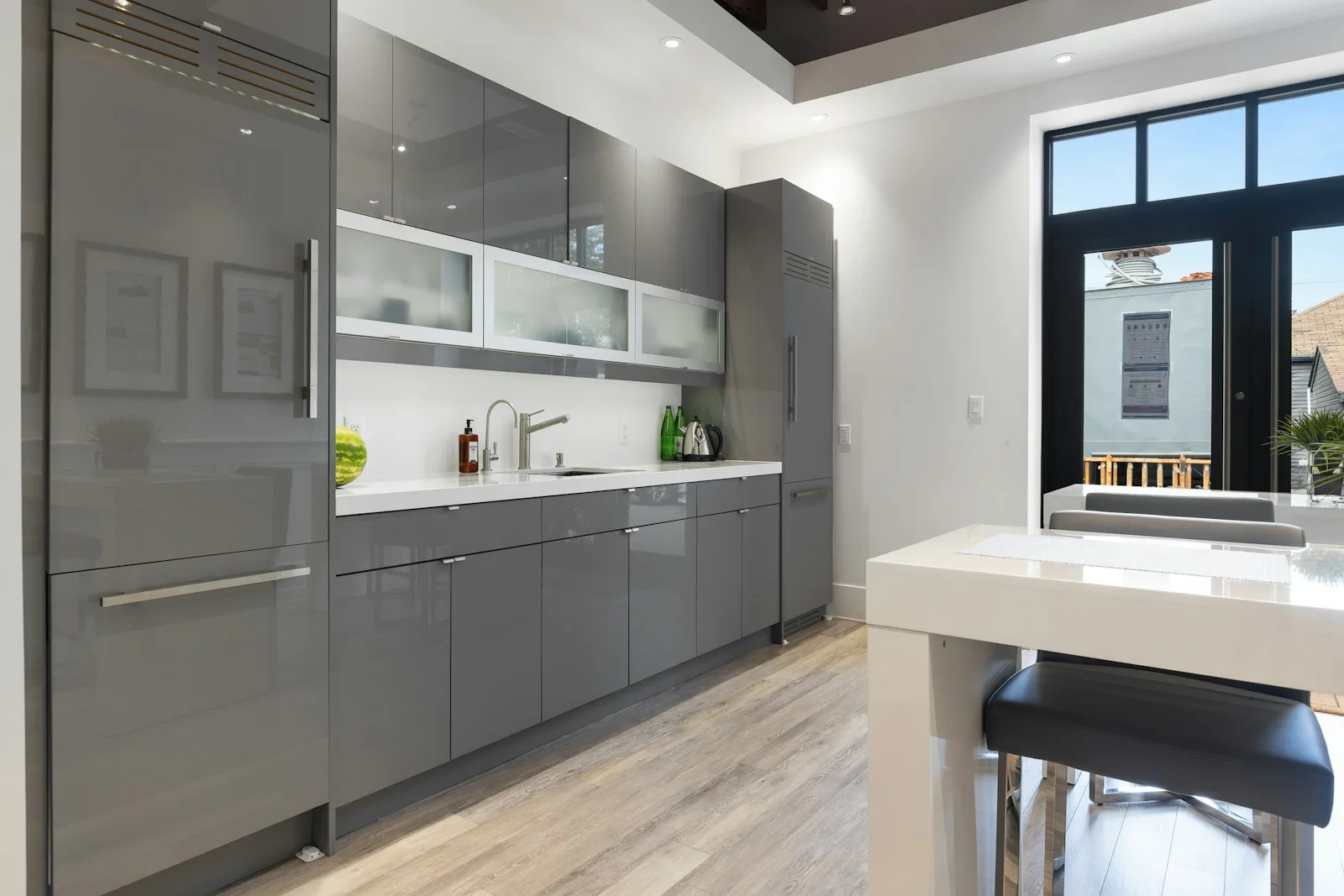 a kitchen with a glass door